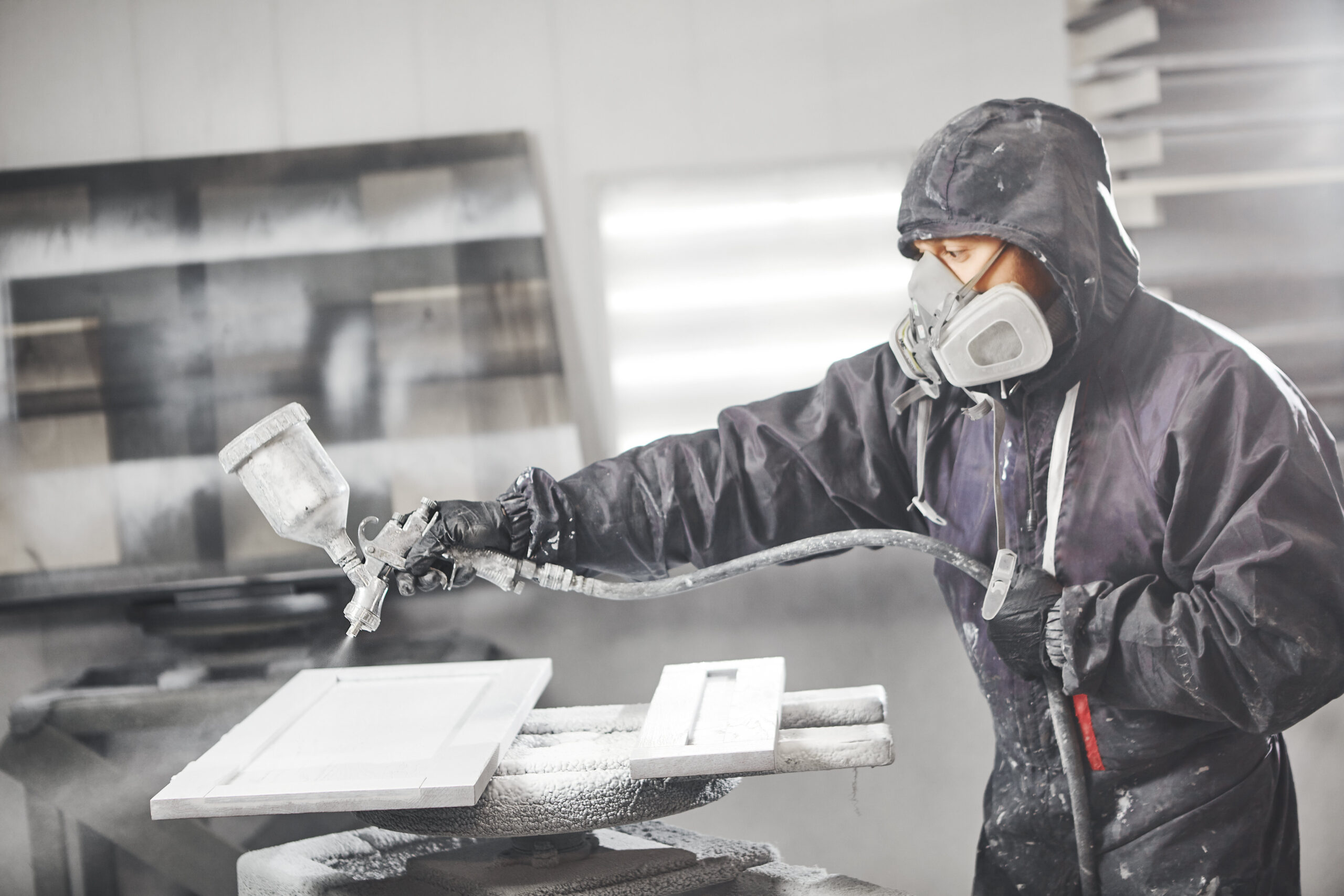 staining-wood-with-white-spray-gun-application-of-flame-retardant