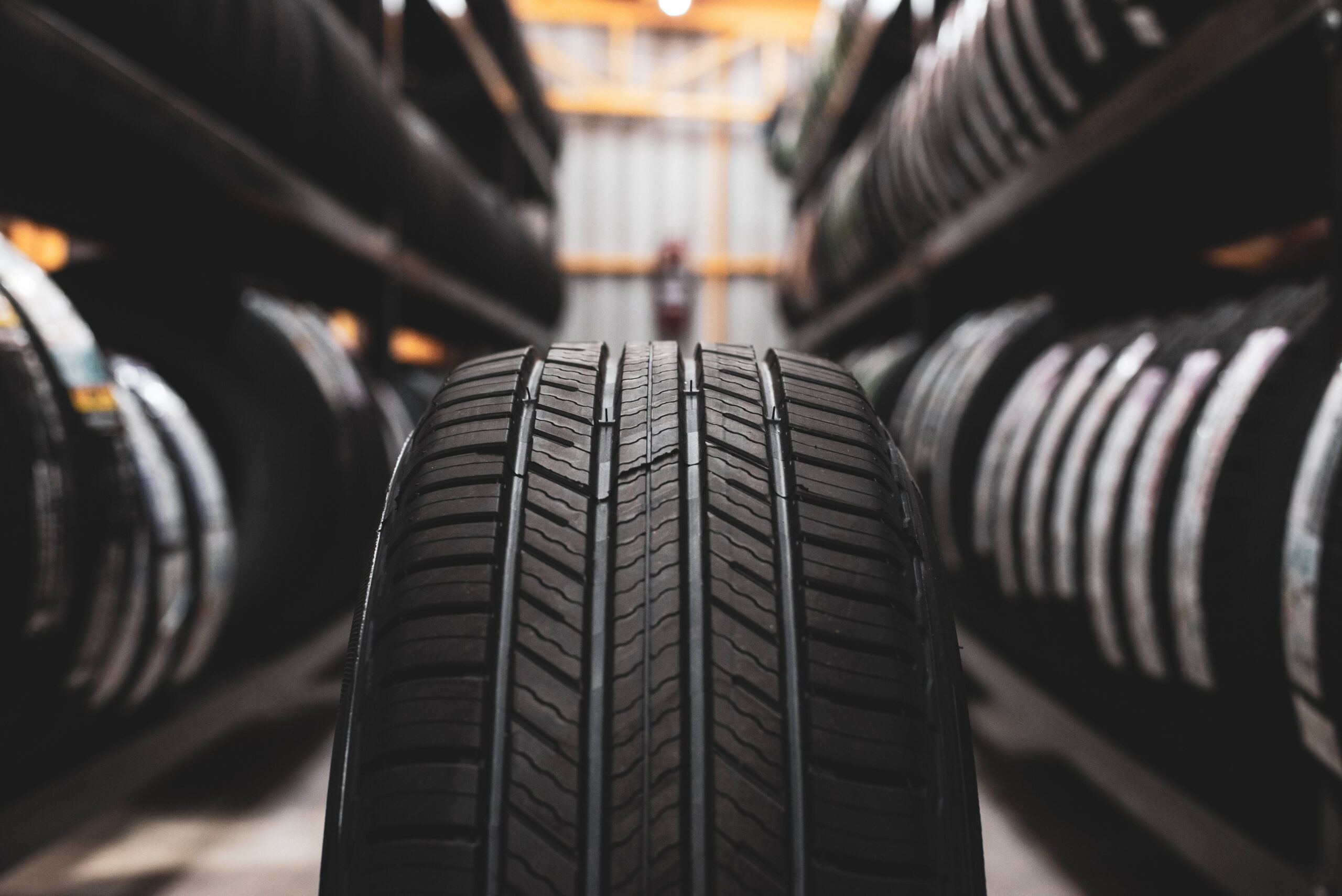 a-new-tire-is-placed-on-the-tire-storage-rack