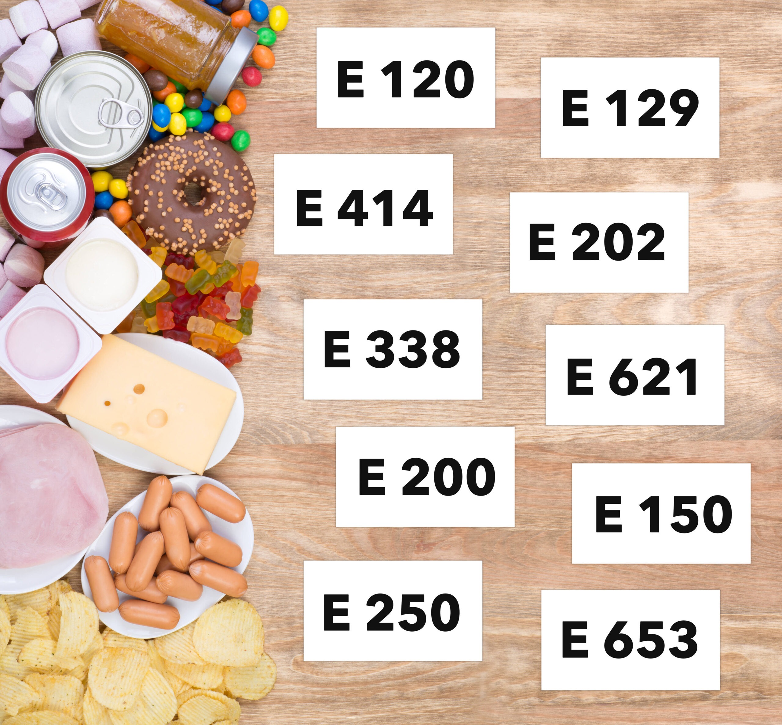 food-containing-unhealthy-additives-on-wooden-background